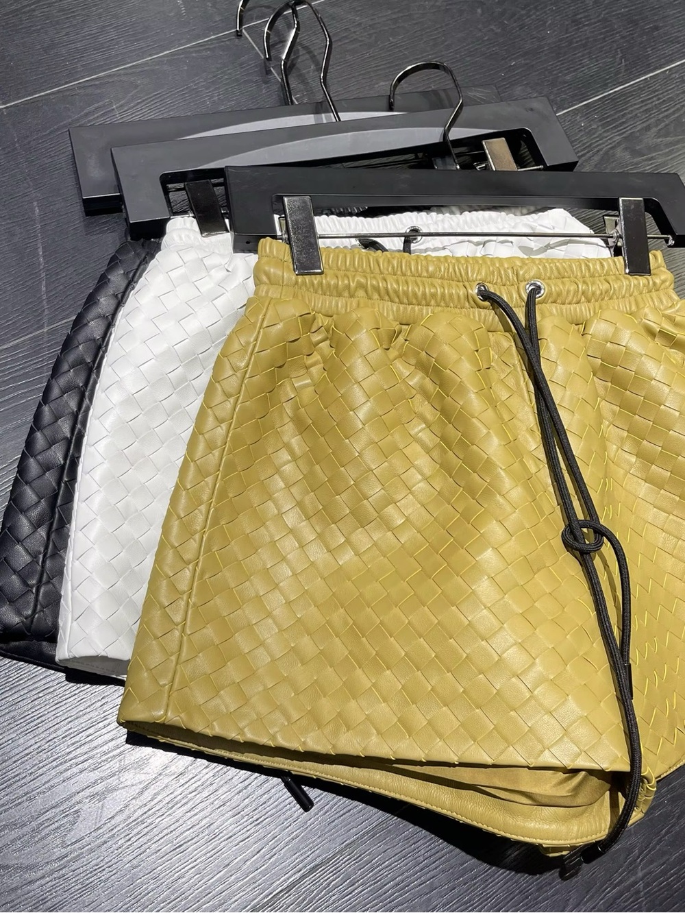 Bebe Leather Basket Weave Shorts